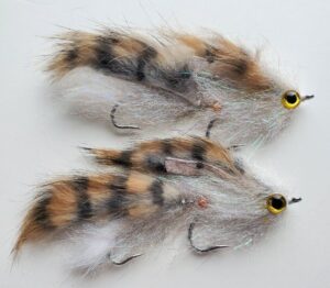 brown and white articulated streamer fly