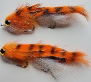 orange and white articulated streamer fly